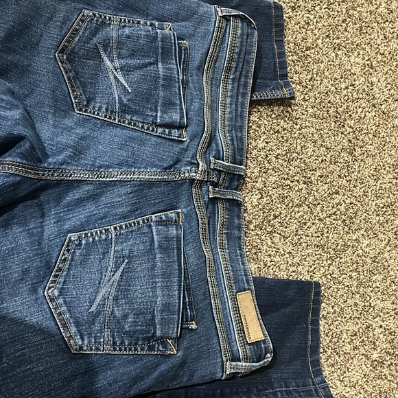 These are blue bootlegger skinny low rise size 32 w 33 L - Picture 3 of 3